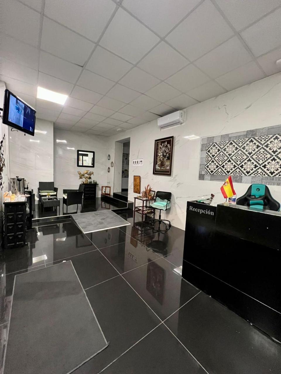 Hostal Milan Alicante Exterior photo Reception area of the Embassy of Spain in Tirana